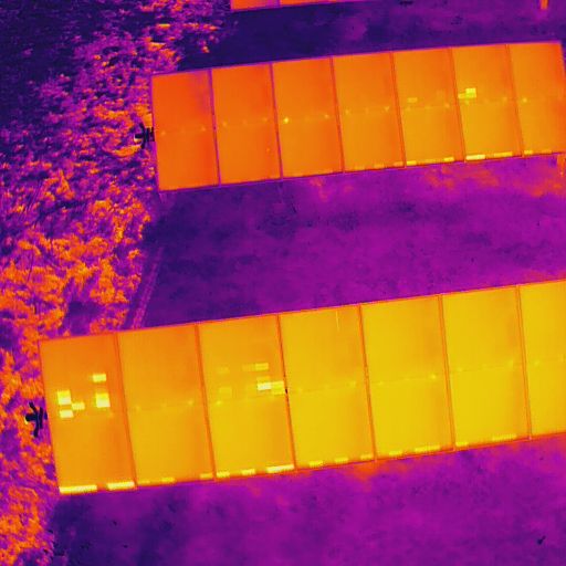 thermal image of solar farm panels - energy industry