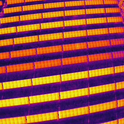 thermal image of solar farm panels - energy industry