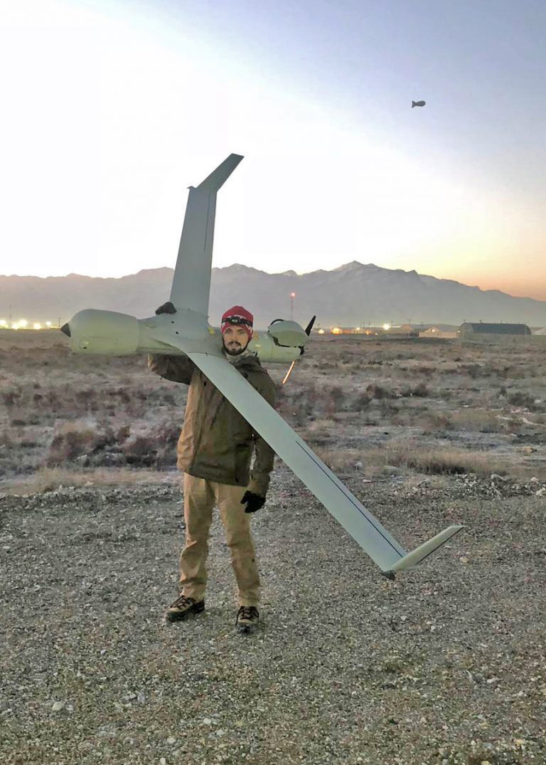 Daniel Sautter holding large drone